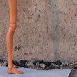 Наора – девчонка из миров Тамикана – и подвижность ее тела