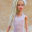 Tamikan Space Gal Kioni with Curious face, cyber leg, Stanced torso, Mediterranean skin tone